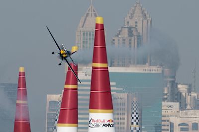 Francois Le Vot flies between two inflatable pylons during the Red Bull Ai Race Challenger Cup.