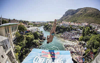 Nikita Fedotov dives from the 27 metre platform on Stari Most during the fifth stop of the Red Bull Cliff Diving World Series at Mostar, Bosnia and Herzegovina on September 16, 2017.