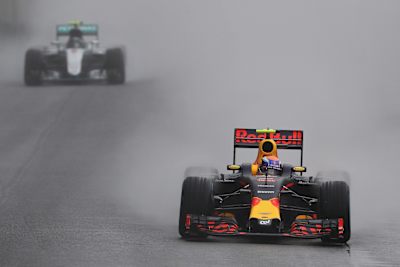 Max Verstappen leads Nico Rosberg at the 2016 Brazilian F1 Grand Prix in Interlagos, Sao Paulo.
