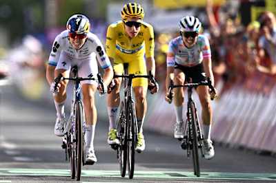 Demi Vollering of FDJ United Suez leads Marlen Reusser and Katarzyna Niewiadoma-Phinney to the finish of the 2026 Tour de France Femmes Stage 5 in Belleville-en-Beaujolais, France