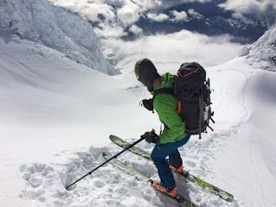 Adventurer Colin O'Brady prepares to ski down Denali after climbing up the mountain during his record-breaking summiting of the highest point in all 50 states of the USA in 21 days.