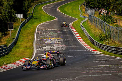 Sebastian Vettel in a Red Bull RB 7, David Coulthard in a Red Bull RB 8 seen during the Red Bull Formula Nürburgringg 2023