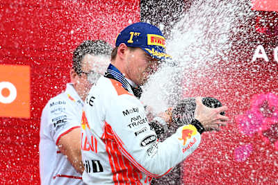 Race winner Max Verstappen of the Netherlands and Oracle Red Bull Racing celebrates on the podium during the F1 Grand Prix of Japan at Suzuka Circuit on April 6, 2025 in Suzuka, Japan.