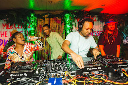 A photo of Time Cow's digital dancehall crew Equiknoxx performing with Shanique Marie at Red Bull Music Odyssey in London in June, 2018.