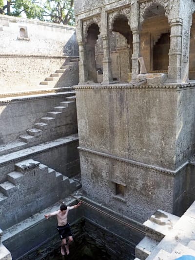 Amateur cliff diver Michael Henry jumps into a stepwell at an unnamed fort near Talab Gaon on the outskirts of Bundi, Rajasthan