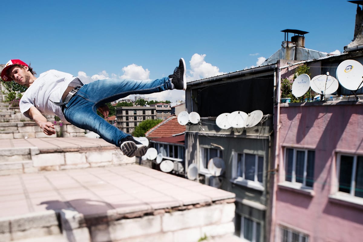 A Turkish freerunner puts his parkour skills into practice in Istanbul
