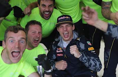Max Verstappen celebrates finishing third with his team during the Formula One Grand Prix of Brazil at Autodromo Jose Carlos Pace on November 13, 2016 in Sao Paulo, Brazil. 
