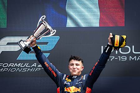 Isack Hadjar on the Formula 2 podium at the Emilia-Romagna Grand Prix.