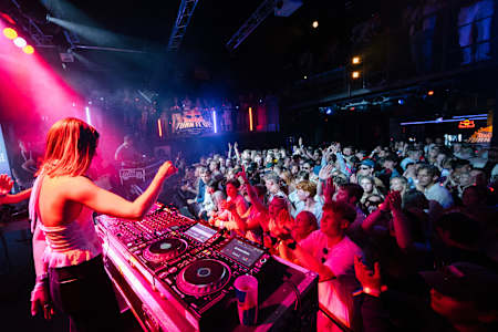 The crowd comes alive at Red Bull Turn It Up 2025 in Helsingborg as DJ HannaH playes a set during Bayside Festival's Official After Party at The Tivoli July 12th. 