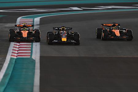 Max Verstappen leads Lando Norris and Oscar Piastri during the F1 Grand Prix of Abu Dhabi at Yas Marina Circuit on December 07, 2025 in Abu Dhabi, United Arab Emirates.