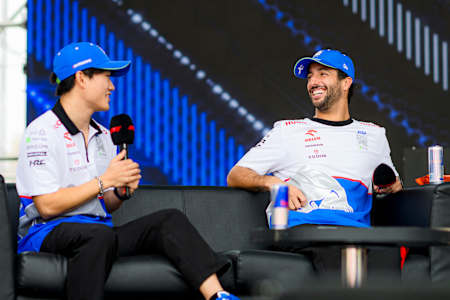 Daniel Ricciardo and Yuki Tsunoda talk to the crowd on the fan stage prior to practice ahead of the F1 Grand Prix of Azerbaijan at Baku City Circuit on September 13, 2024 in Baku, Azerbaijan.