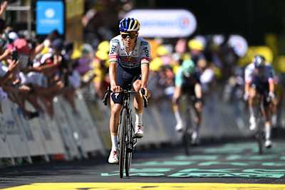 Remco Evenepoel of Red Bull - BORA - hansgrohe crosses the finish line at Le Lioran, France, during Stage 10 of the 2026 Tour de France.
