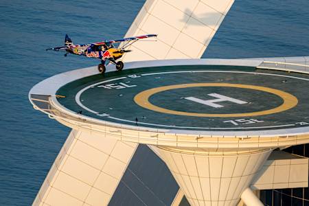 Luke Czepiela of Poland lands as first person in history an airplane (a CubCrafters Carbon Cub UL) on the helipad of the Burj al Arab Hotel in Dubai, United Arab Emirates on March 14, 2023.