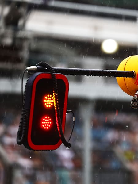 A red light in the rain at the 2024 São Paulo F1 Grand Prix.