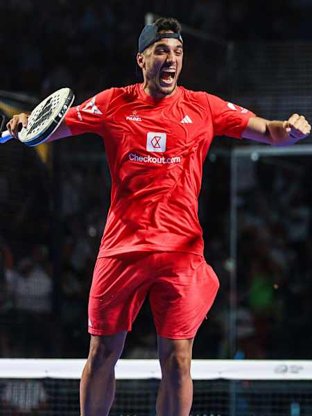 Alejandro Galan (L) of Spain and Federico Chingotto of Argentina celebrate after winning the BNL Italy Major Premier Padel final match held at the Foro Italico in Rome, Italy on June 15, 2025.