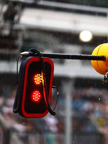 A red light in the rain at the 2024 São Paulo F1 Grand Prix.
