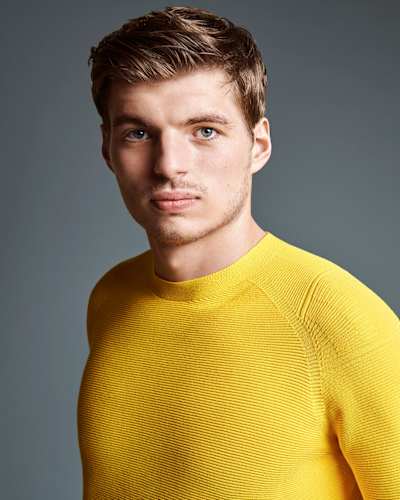  Verstappen wears a 3D knit jumper by AlphaTauri.