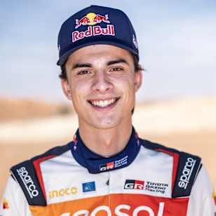 Red Bull athlete Seth Quintero, representing Toyota Gazoo Racing, dons his race suit ahead of the thrilling Dakar 2026 rally in Dubai, UAE, ready for high-octane adventure.
