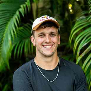 Aidan Heslop of the UK smiles at the first stop of the Red Bull Cliff Diving World Series in Bali, Indonesia on May 20, 2026, surrounded by lush tropical greenery