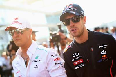 Michael Schumacher und Sebastian Vettel beim F1 Grand Prix von Abu Dhabi, 2014. 