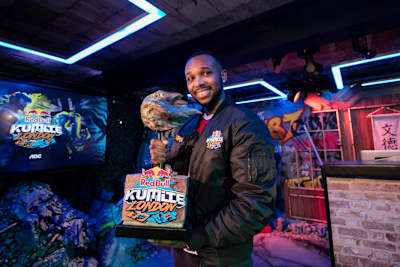 Mister Crimson lifts the trophy at the Red Bull Kumite event in London, UK on May 23, 2021  
