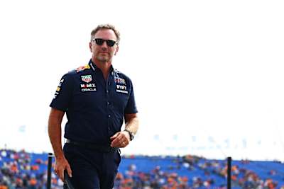 Red Bull Racing Team Principal Christian Horner looks on in the Paddock during practice ahead of the F1 Grand Prix at Circuit Zandvoort on August 25, 2023 in Zandvoort, Netherlands. 