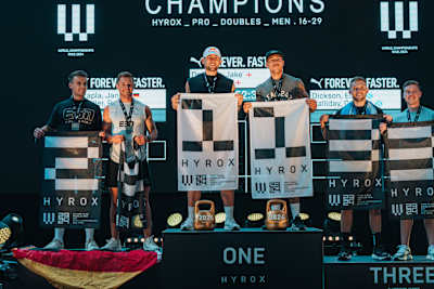Jake Dearden and Marc Dean stand on the first place of the podium for the doubles category at the Hyrox World Championship in Nice, France, on June 9. 2024. 