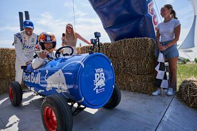 Daniel Ricciardo pushing Yuki Tsunoda at the start of the race during F1 Soapbox Race in Montreal, Canada on June 5, 2024.