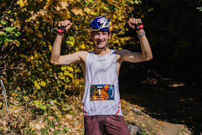 Rémi Bonnet celebrates his new world record after his race at the KM Vertical Fully in Fully, Switzerland on October 18, 2025.
