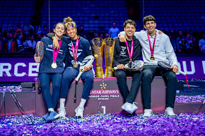 Arturo Coello, Agustin Tapia, Bea González and Claudia Fernández pose with their trophies and medals after winning the Premier Padel 2025 Finals semifinals in Barcelona, Spain.