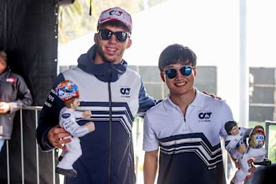 Pierre Gasly and Yuki Tsunoda at the Fans Forum during practice ahead of the F1 Grand Prix of Mexico at Autodromo Hermanos Rodriguez on October 28, 2022 in Mexico City, Mexico. 