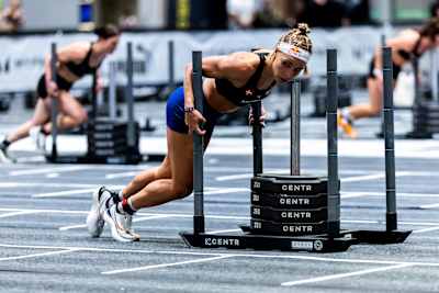Ida Mathilde Steensgaard from Denmark at the sled push during the Hyrox Elite 15 competition in Hong Kong, part of the intense Hyrox Major 2024 series.