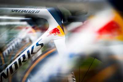 A close-up of the Red Bull BORA-hansgrohe bike during Milano-Sanremo 2025, showcasing the aerodynamic design.