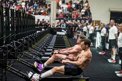 Tim Wenisch and Hunter McIntyre compete fiercely on rowing machines during the Men’s Elite 15 at Hyrox Chicago, USA.