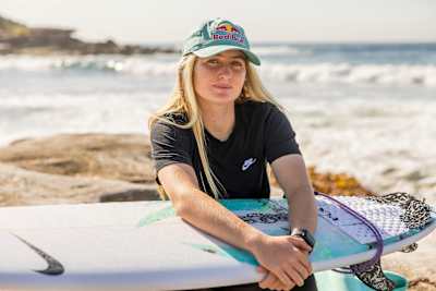 Rising star Sierra Kerr poses with her surfboard in Sydney, Australia. 