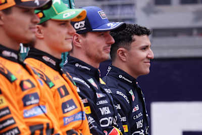 Isack Hadjar and Max Verstappen of Oracle Red Bull Racing and McLaren's Oscar Piastri and Lando Norris prior to the F1 Grand Prix of Australia at Albert Park on in 2026.
