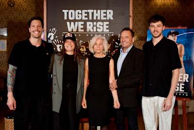 Laura Horváth and her family celebrate the Budapest premiere of her documentary, Together We Rise, which covers her inspiring athletic journey.