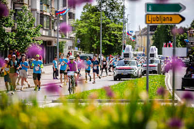 Runners dash through the streets of Ljubljana during the Wings for Life World Run 2025.