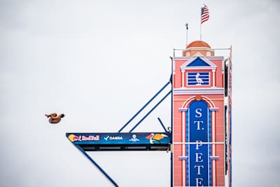 On June 4, 2026, Sergio Guzman of Mexico performs a daring dive from the 27 metre platform at the Red Bull Cliff Diving World Series in St. Petersburg, USA, showcasing extreme skill and courage