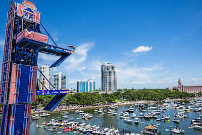 On June 6, 2026, Oleksiy Prygorov of Ukraine dives from the 27 metre platform in St. Petersburg, USA at the thrilling Red Bull Cliff Diving World Series amid a buzzing waterfront crowd