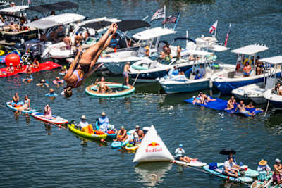 Australian diver Rhiannan Iffland plunges from 21 metres in the Red Bull Cliff Diving World Series at St. Petersburg, USA, thrilling fans on boats and kayaks in the summer of 2026
