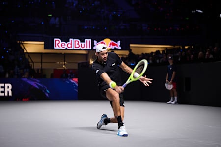 Matteo Berrettini in action at Red Bull Bassline 2024, competing at Wiener Stadthalle, Vienna, Austria on October 18, delivering high-energy tennis in a dynamic Red Bull atmosphere