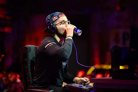 Adel 'Big Bird' Anouche drinks a can of Red Bull during an intense match at Red Bull Kumite New York 2024 in Brooklyn.
