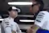Ayumu Iwasa and Laurent Mekiestalk in the garage during practice ahead of the F1 Grand Prix of Abu Dhabi at Yas Marina Circuit on December 6, 2024 in Abu Dhabi, United Arab Emirates.