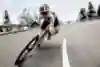 Tom Pidcock rides with exhilarating speed during on Rossfeld in the German Alps.