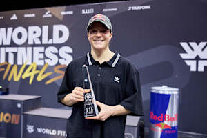 Laura Horváth proudly holds her trophy after winning the 2025 World Fitness Project Finals in Copenhagen, Denmark.