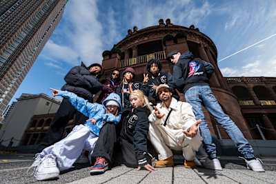 The 8 wildcards of the Red Bull Dance Your Style World Final 2023 posing for a group shot at the Festhall in Frankfurt, Germany, on November 3rd, 2023.