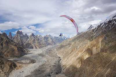 Paragliding pilot Tom de Dorlodot soars above the Baltoro glacier in Pakistan on July 8, 2022. 