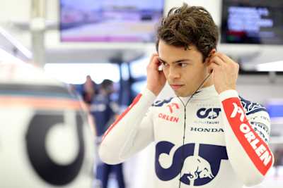 Nyck de Vries of Netherlands and Scuderia AlphaTauri prepares to drive in the garage during day three of F1 Testing at Bahrain International Circuit on February 25, 2023