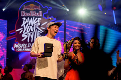 THE D Soraki receives the trophy at Red Bull Dance Your Style World Final 2022.